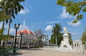 Images Dated 2029: Cienfuegos Cuba Jose Marti Square in center with statue of Jose Marti and palms