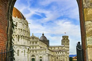 Images Dated 30th May 2019: City gate of Piazza del Miracoli with Leaning Tower of Pisa and Pisa Baptistery of St