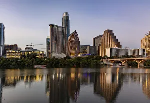 Prints of City skyline reflects in the Colorado River in Austin, Texas, USA Images Dated 2020 May: City skyline reflects in the Colorado River in Austin, Texas, USA