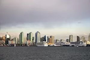 Cityscape with three cruise ships docked in San Diego, California