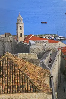 Tile Roof Prints: Cityscape of red roof houses domited by Bell Tower in Dubrovnik by Adriatic Sea, Croatia