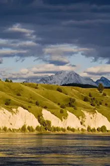 Mission Valley Prints: Clay Cliffs reflect into the Flathead River with Mission mountains in the background