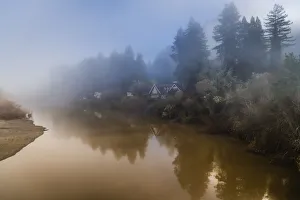 Clearing Prints: The clearing fog from the Russian River with the houses along the riverbank early morning