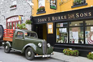 Images Dated 5th June 2005: Clonbur, Ireland. An old truck sits outside John Burkes, a well-known restaurant