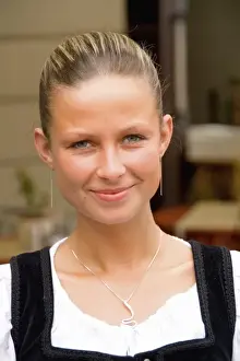 Smile Prints: Close up of beautiful waitress in costume of tourist city of Cesky Krumlov in Czech Republic