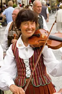 Images Dated 9th August 2020: Close up of local people in traditional costume in dancing band in famous Old Town