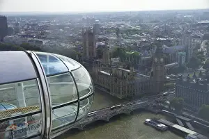 Big Ben Prints: A close up shot of the glass capsule on the London Eye as it passes Parliment and Big Ben