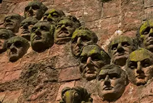 Kutaisi Prints: Close-up of Faces on Facade of Market Building in Central Kutaisi, Georgia