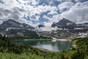 Provincial Park Prints: Clouds over an alpine lake in Assiniboine Provincial Park