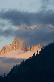 Mystical Prints: Clouds circle Half Dome at sunset - Yosemite National Park, California