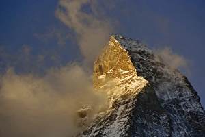 Matterhorn Prints: Clouds around the summit of the Matterhorn at sunrise, Zermatt, Switzerland
