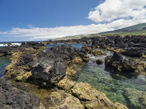 Coast with lava flow and beach near Biscoitos