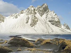 Stormy Prints: Coastal landscape with dunes at iconic Stokksnes during winter and stormy conditions