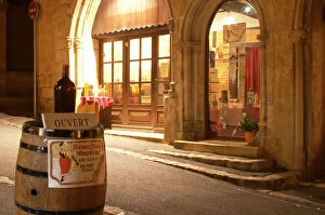 Images Dated 18th November 2005: Cobble stone street in the old town with a wine shop, a wine barrel on the street