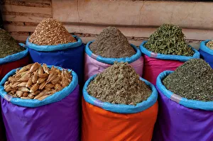 Herb Prints: Colorful bags of spices for sale at the Medina Souk. Marrakech, Morocco