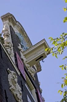 Images Dated 6th September 2007: Colorful bulding facade with gable and hook in Amsterdam