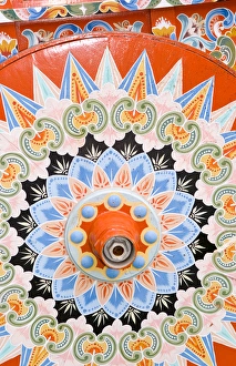 Carriage Prints: Colorful close up of famous wheel for carriages that are traditional in and around