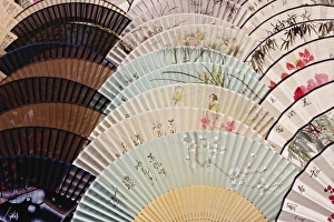 Xian Prints: Colorful fans at market in Xian, China