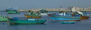 Colorful fishing boats in the Harbor of Alexandria Egypt and the Mediterranean Sea