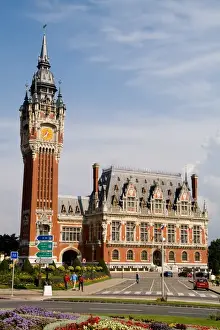 Images Dated 12th August 2020: Colorful flowers in sunshine of beautiful Hotel de Ville architecture in small Frence
