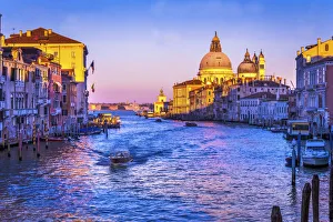 Grand Canal Prints: Colorful Grand Canal and Santa Maria della Salute church under sunset with reflection in