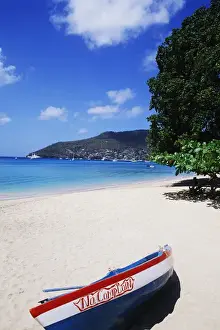 Colorful graphic boat Princess Margaret Beach in Bequia, Grenadines