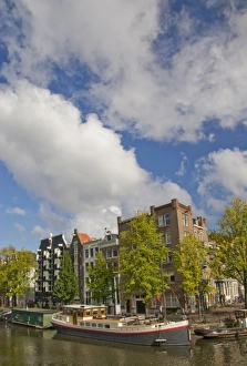 House Boat Prints: Colorful houseboats line an Amsterdam canal