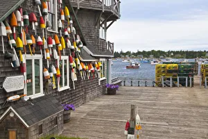 Bernard Prints: Colorful lobster buoys hang from harbor deck in Bernard, Maine, USA