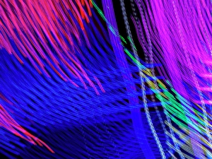 Images Dated 3rd September 2024: Colorful motion blur abstract of a ride at a carnival