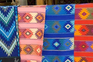 Blanket Prints: Colorful patterns and fabrics mademade artwork in San Antonio on remote Lake Atitlan