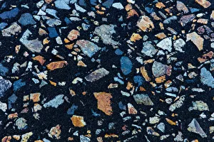 Colorful rocks in black sand dunes near Hofn, Iceland
