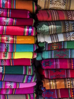 Colorful scarfs or blankets for tourists. Town of Humahuaca in the Quebrada de Humahuaca canyon Colorful scarfs or blankets for tourists. Town of Humahuaca in the Quebrada de Humahuaca canyon