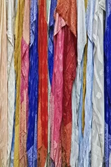 Images Dated 31st January 2006: Colorful silk scarves, bazaar, Luxor, Egypt