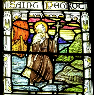 Prints of Colorful St. Petroc Devon Saint stained glass St. Petroc Church, Dartmouth, Devon, England. Petroc lived in 500 AD. Church originally founded in 1192. (Editorial Use Only) Images Dated 2024 December: Colorful St. Petroc Devon Saint stained glass St