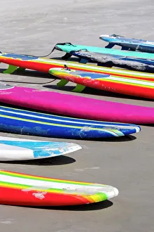 Watersport Prints: Colorful surfboards on the beach