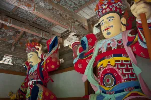 North Korea Prints: Colourful statues at the Buddhist Pohyon-temple, Mount Myohyang-san, North Korea