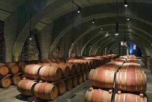 Concrete Roman arches support the ceiling in the cave barrel cellar of Mission Hill