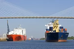 Images Dated 18th September 2007: Container ships pass under the Talmadge Memorial Bridge at the Port of Savannah in Savannah
