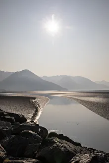 Prints of Cook Inlet, Alaska, curved stream, mountains, black and white, sunburst Images Dated 2020 March: Cook Inlet, Alaska, curved stream, mountains, black and white, sunburst