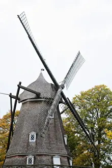 Low Angle Prints: Copenhagen, Denmark - A historic old style windmill after having been restored. Vertical