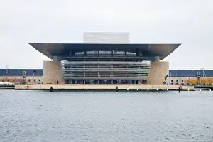 Futuristic Prints: Copenhagen, Denmark - A modern opera house on a waterfront. Horizontal shot