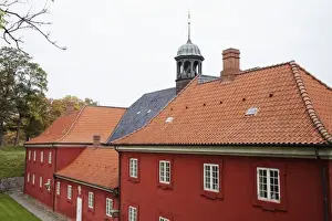 Inti St Clair Prints: Copenhagen, Denmark - Red military barracks are surrounded by grass and trees