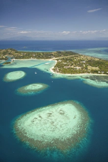 Fringing Prints: Coral reef and Malolo Lailai Island, Mamanuca Islands, Fiji, South Pacific - aerial