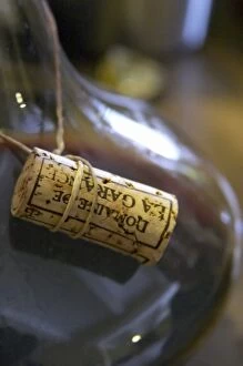 The cork tied in a sting around the neck of the decanter. Domaine de la Garance. Pezenas region