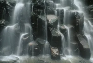 Blurred Prints: Costa Rica, La Amistad Biosphere Reserve, Rio Negro waterfall, waterfall on basalt rock