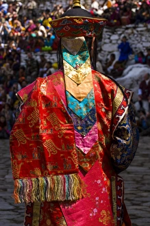 Dance Prints: Costumed dancers at religious festivity with many visitors, Paro Tsechu, Bhutan