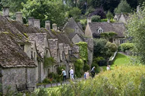 Cotswold Prints: Cotswold stone cottages in the village of Bibury, Gloucestershire, England