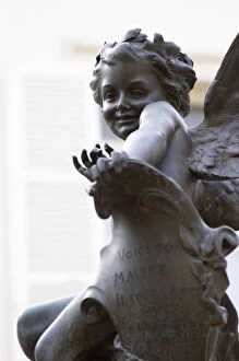 Images Dated 15th June 2005: In the court yard at Champagne Deutz a statue of young Cupid It has given the name