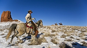 Images Dated 14th February 2008: Cowboy with horses on the range on The Hideout Ranch in Shell Wyoming