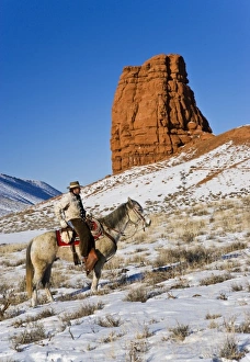 Western Scenic Prints: Cowboy with horses on the range on The Hideout Ranch in Shell Wyoming